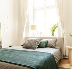 Flowers next to bed